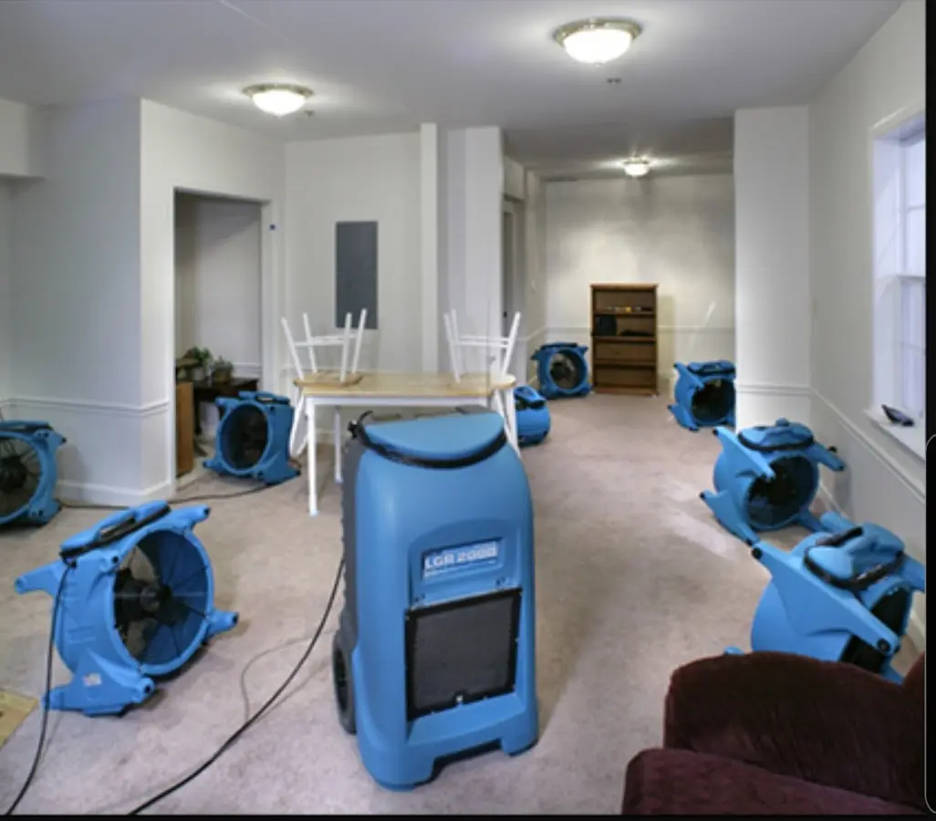 Air movers and dehumidifier setup for Water Damage Restoration in Tuscumbia